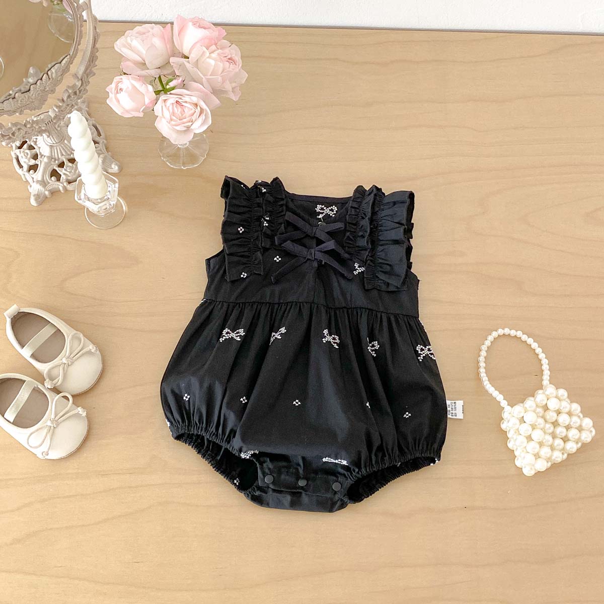 Baby Clothing Online - رومبير أسود مطبوع عليه فيونكة للفتيات