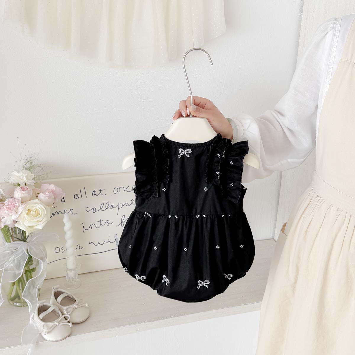 رومبير أسود مطبوع عليه فيونكة  - مراجعة Baby Clothing Online وسعره