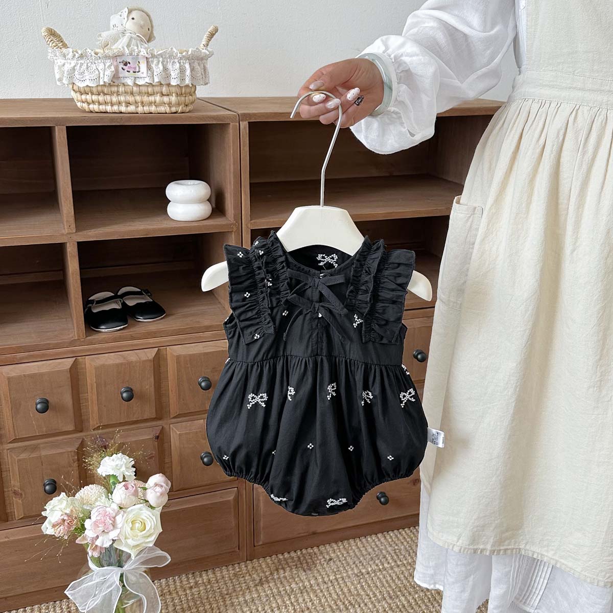 رومبير أسود مطبوع عليه فيونكة  - مراجعة Baby Clothing Online وسعره